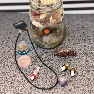 Crystal surprise jar full of witchy goodies.